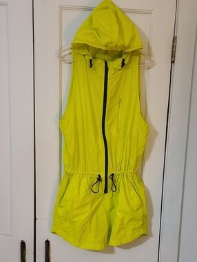 Women's FREE PEOPLE MOVEMENT neon yellow romper in size Medium